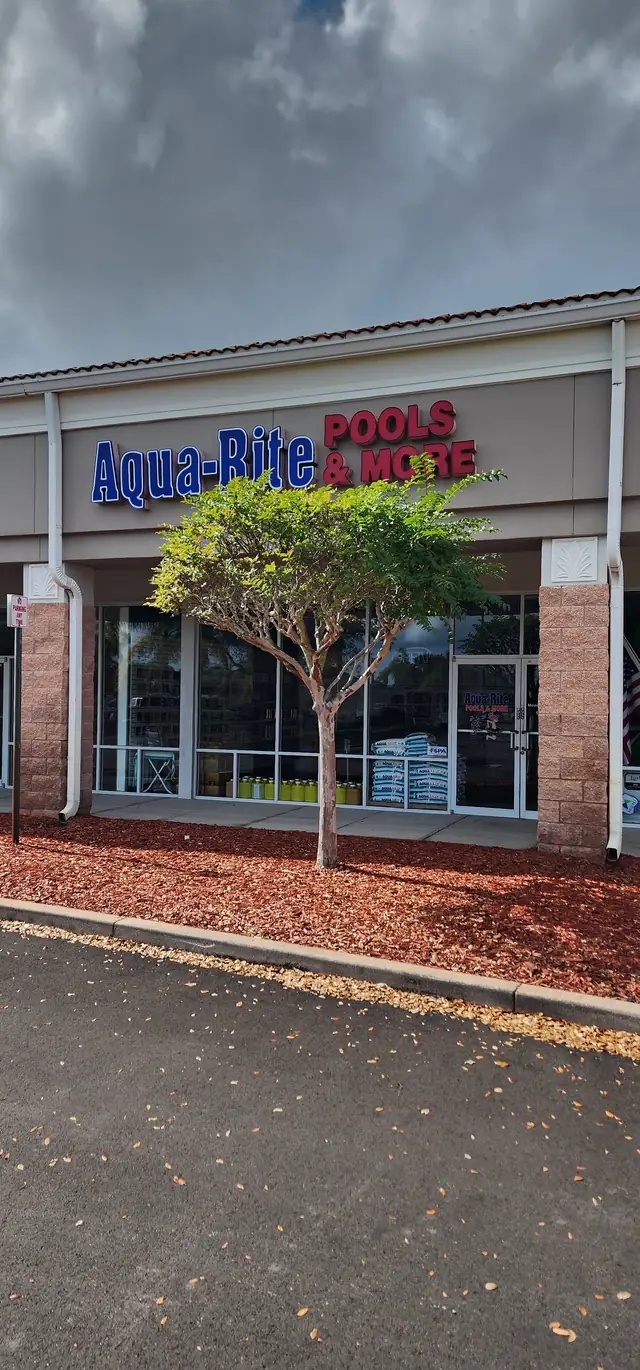 Aqua-Rite Pools & More storefront sign in the Post Commons Shopping Center on Wickham Road